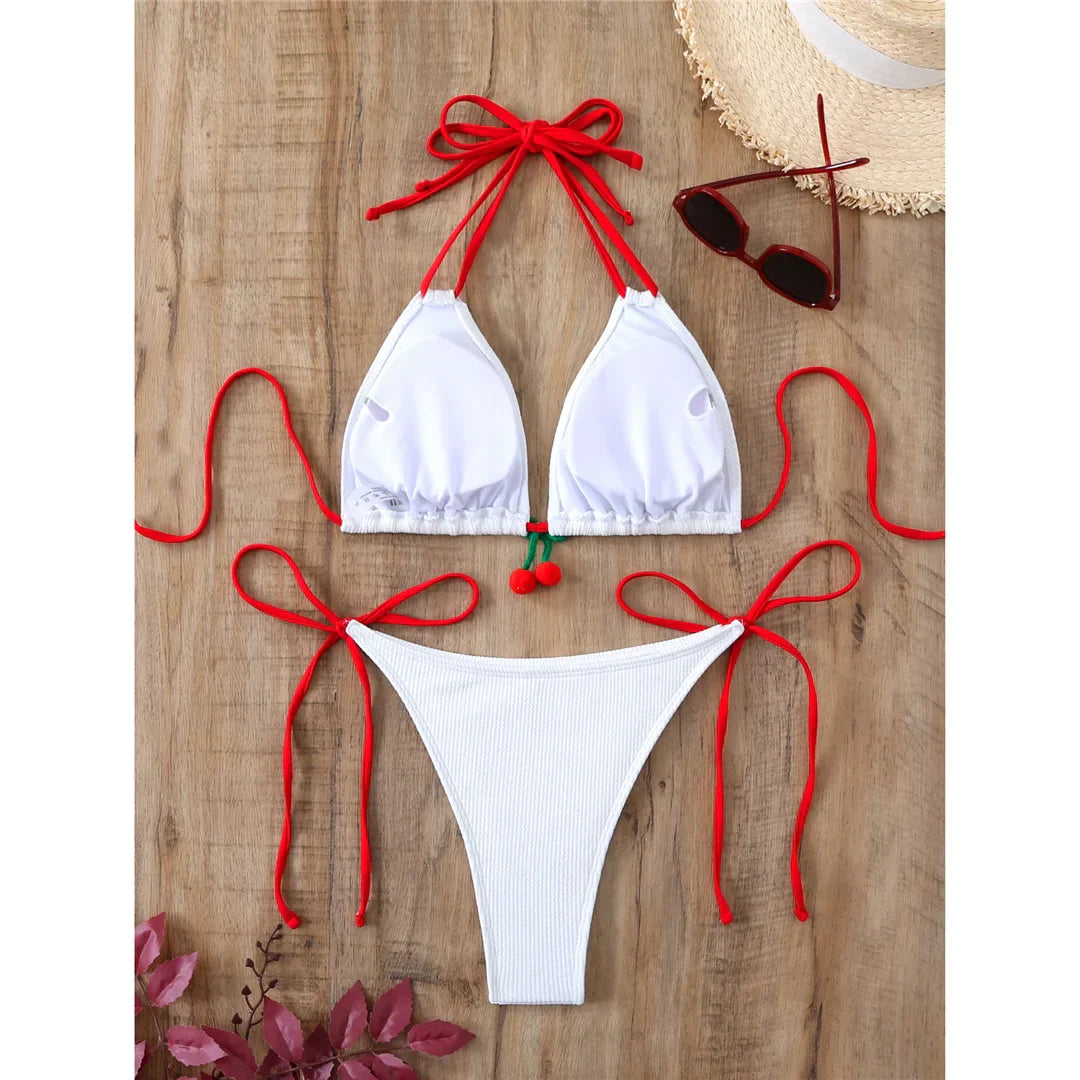 Dwuczęściowy strój kąpielowy z wiązaniami na biodrach i szyi