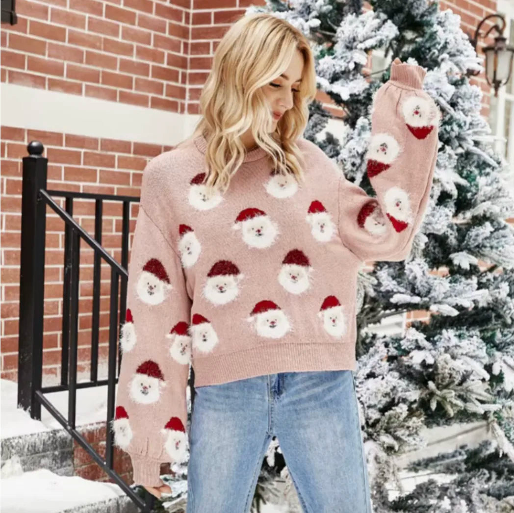 Świąteczny sweter z motywem Mikołajów