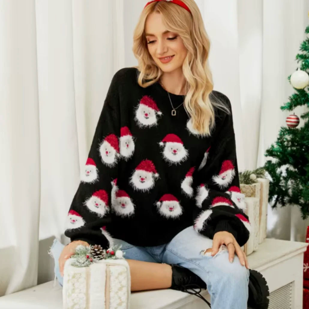 Świąteczny sweter z motywem Mikołajów