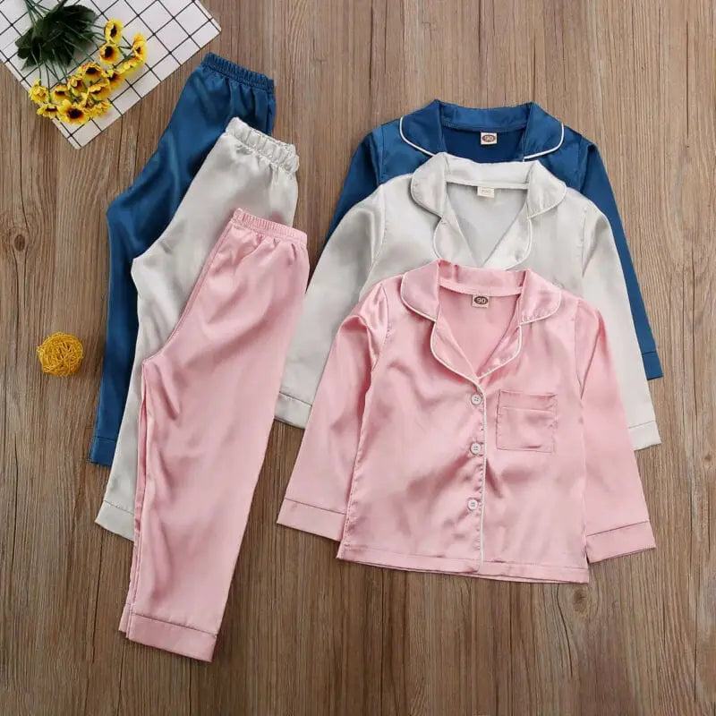Satynowa piżamka dziecięca - Różowy / 80cm