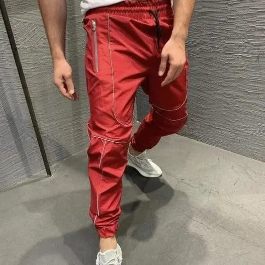 Spodnie dresowe z paskami - Czerwony / S