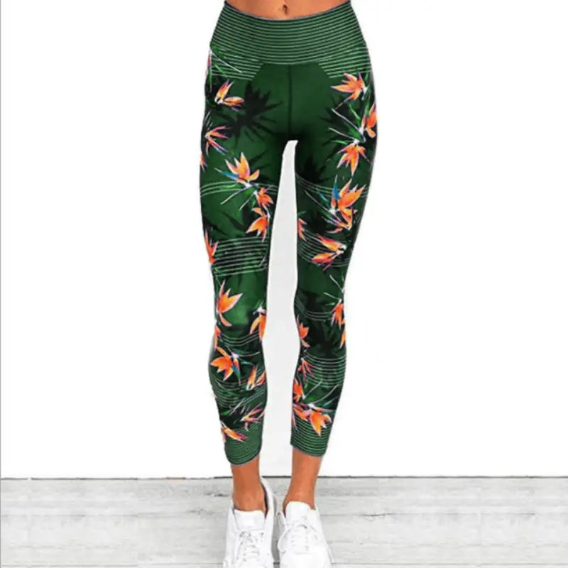 Sportowe legginsy z motywem kwiatów - Zielony / S